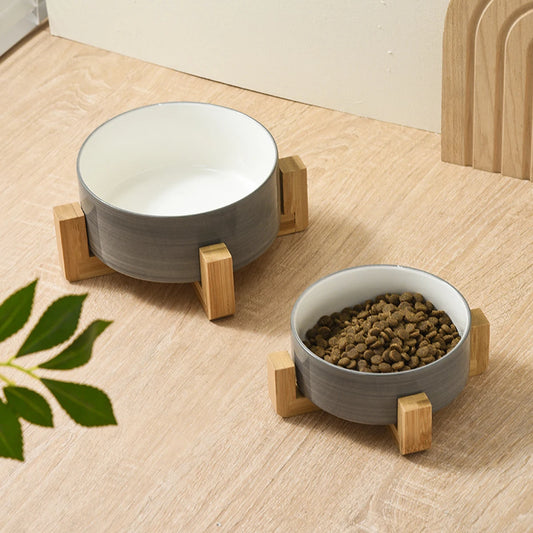 Bol ceramic albastru cu relief in forma de labuta, pe suport din lemn