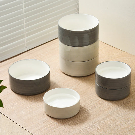 Bol ceramic albastru cu relief in forma de labuta, pe suport din lemn
